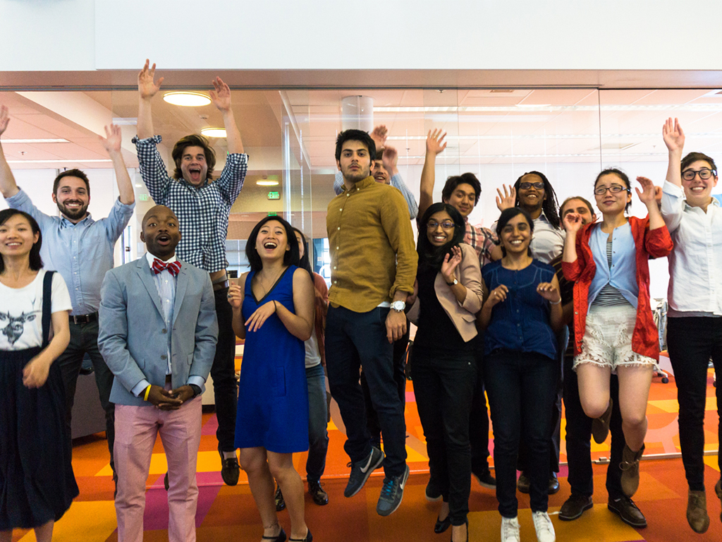 A photo of the 2015 Data Science for Social Good fellows jumping for joy