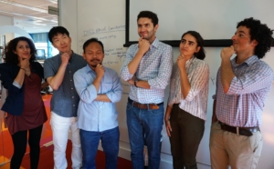A group of Data Science for Social Good participants pose thoughtfully. Photo by Robin Brooks, eScience Institute