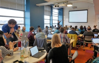 Participants engage in a workshop at Geohackweek