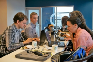 A small group collaborates at Geohackweek. Photo, Robin Brooks, eScience Institute