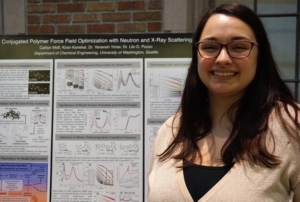 IGERT graduate student Caitlyn Wolf and her poster. Photo, Robin Brooks, eScience Institute