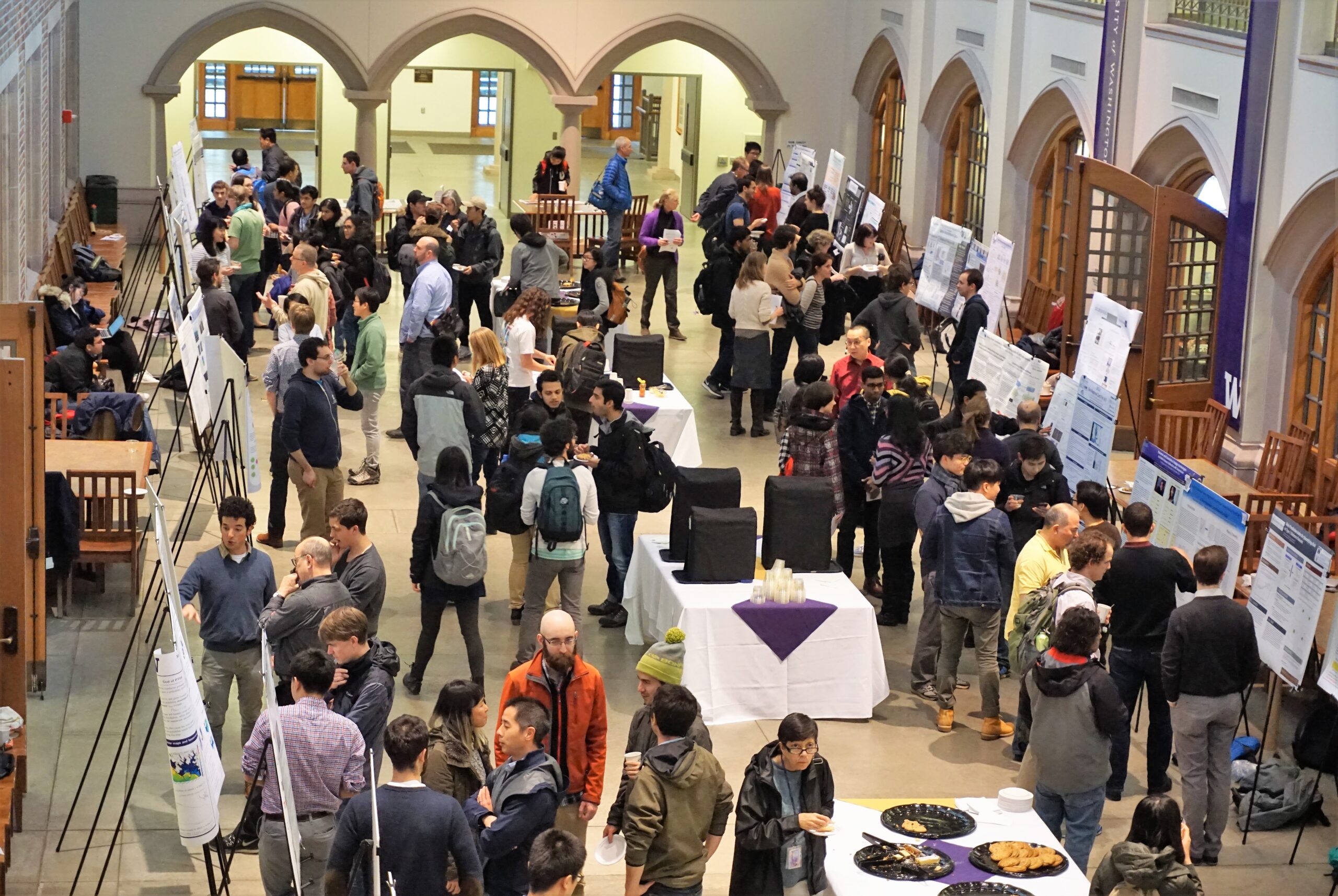A crowd attends the UW Data Science Poster and Networking Session