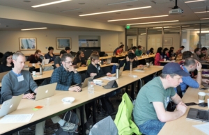 Students work at the Cloud 101 Immersion Day. Photo, Robin Brooks, eScience Institute