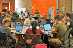 Focused teams work on projects at Neurohackweek 2017. Photo by Robin Brooks