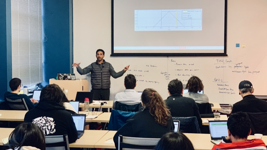 Figure 1: DLI instructor Abe Stern gives an explanation regarding the theory behind convolutional neural networks (CNNs) before the hands on section training these models.