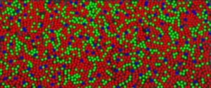 Geometry of Color: Connecting spectral topography of the central cone photoreceptor mosaic to functional limits of the human trichromatic visual system